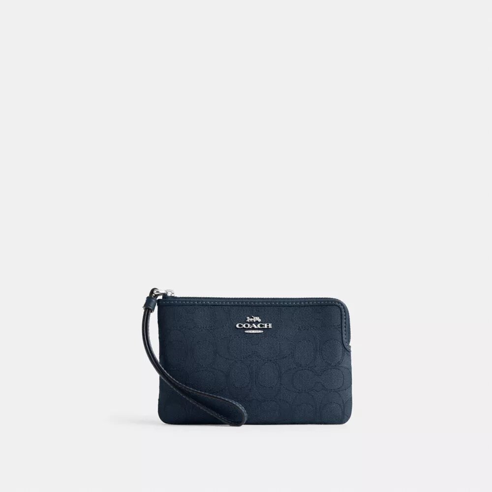 Corner Zip Håndleddsveske i Signature Jacquard