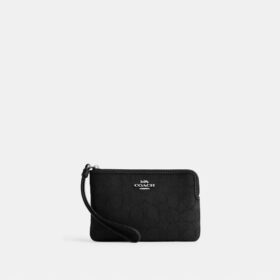 Corner Zip Håndleddsveske i Signature Jacquard