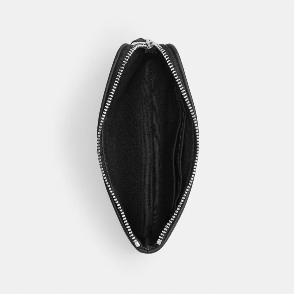 Corner Zip Håndleddsveske i Signature Jacquard