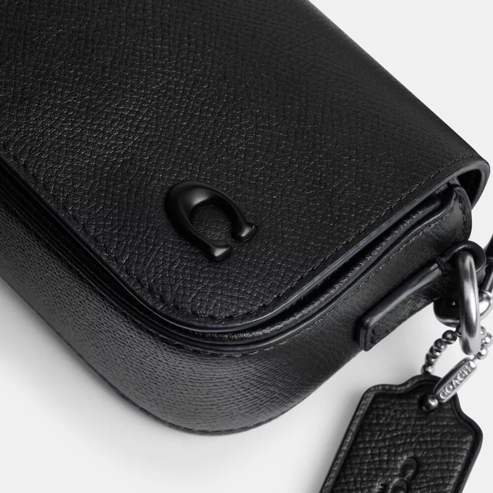 Crossbody-veske med klaff