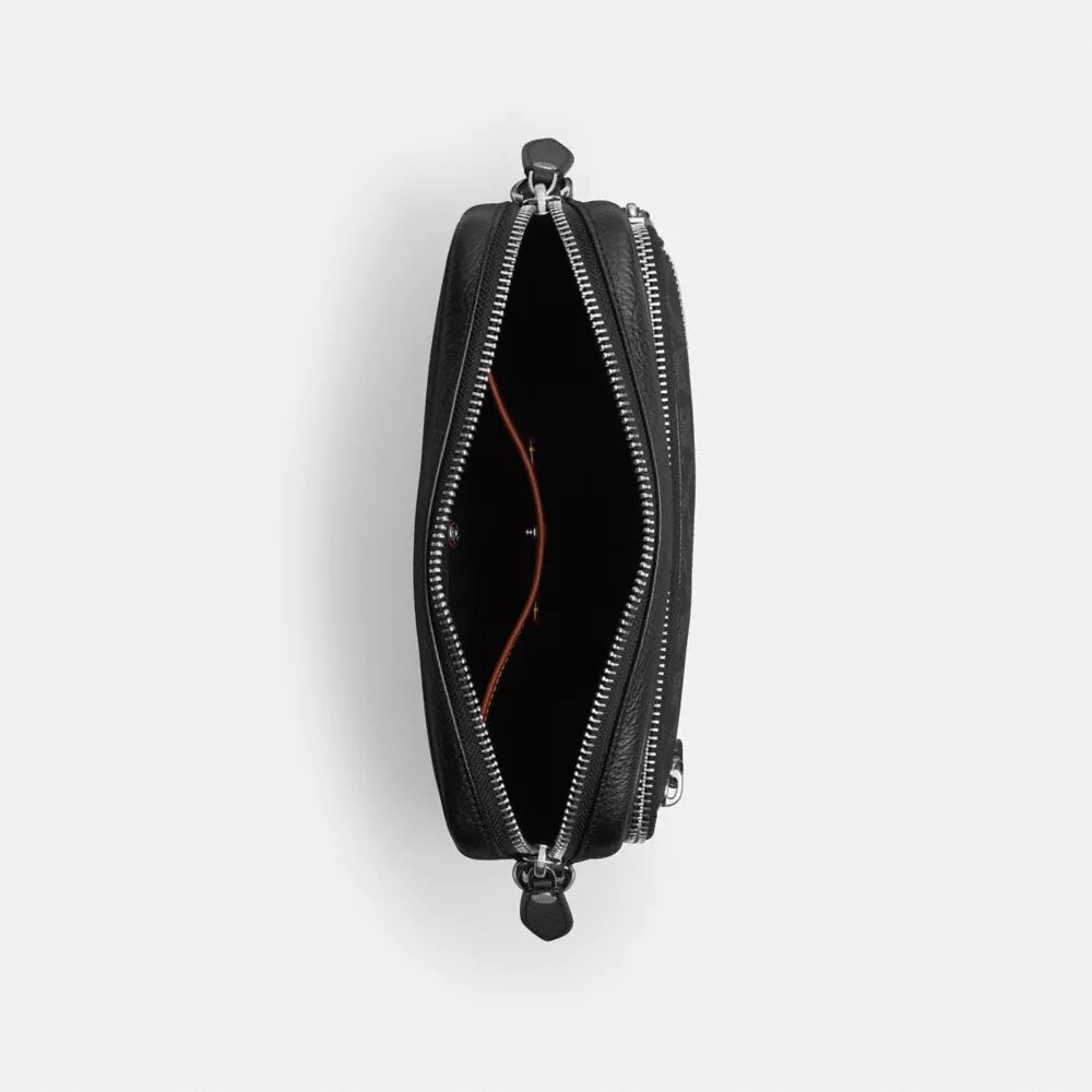 Dakota-crossbody-veske i Signature Canvas