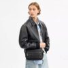 Dakota-crossbody-veske i Signature Canvas