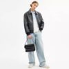 Dakota-crossbody-veske i Signature Canvas