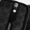 Dakota-crossbody-veske i Signature Canvas