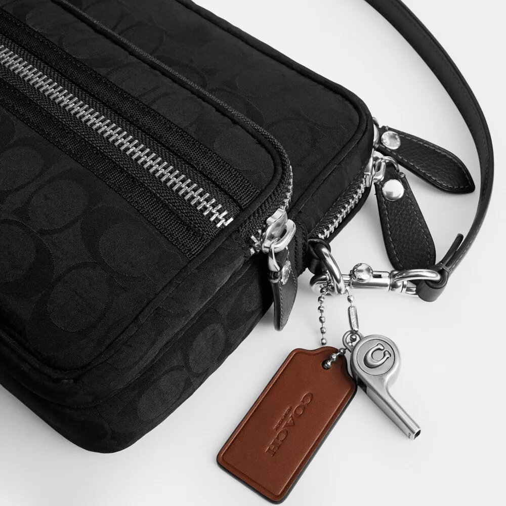 Dakota-crossbody-veske i Signature Nylon