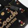 Disney X Coach Cargo Tote-vesker 26 med Mikke Mus i regenerativt bomullslerret