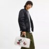 Disney X Coach Compass Bag 35 med Mikke Mus