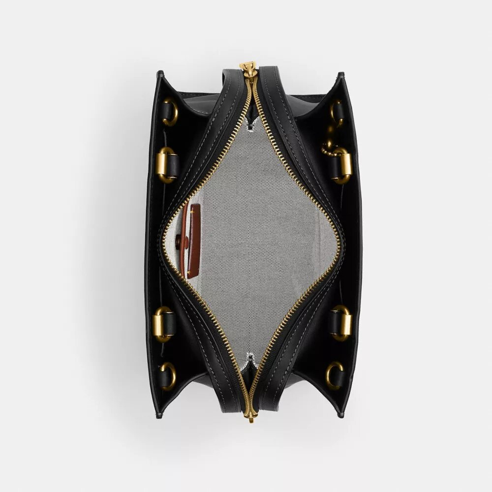 Disney X Coach Rogue-vesker 25 med Pluto