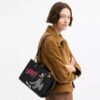 Disney X Coach Rogue-vesker 25 med Pluto