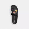 Disney X Coach-slides med klistremerketrykk