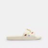 Disney X Coach Udele Sportslides med klistremerketrykk