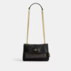 Elodie crossbody-veske 18 i Signature Canvas