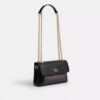 Elodie crossbody-veske 18 i Signature Canvas