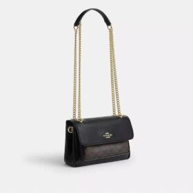 Elodie crossbody-veske 18 i Signature Canvas