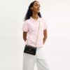 Elodie crossbody-veske 18 i Signature Canvas