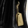 Elodie crossbody-veske 18 i Signature Canvas