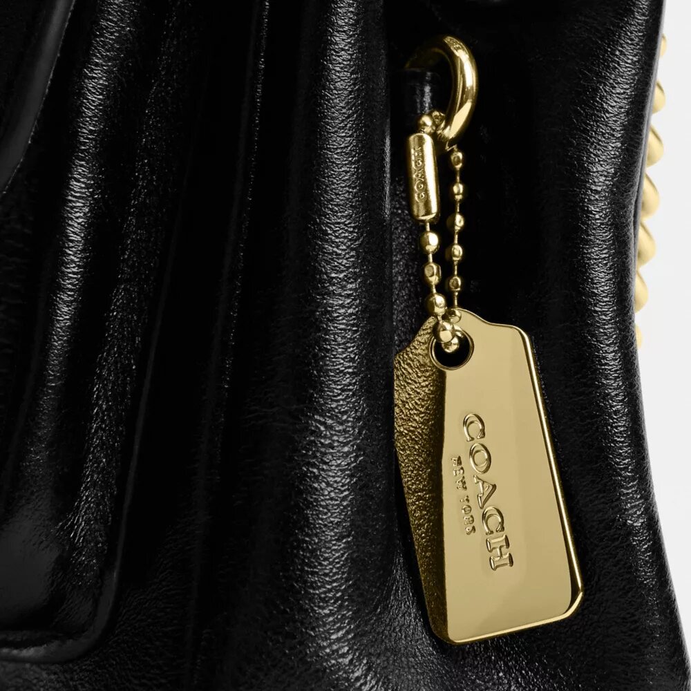 Elodie crossbody-veske 18 i Signature Canvas
