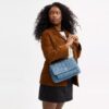 Elodie-crossbody-veske i regenerativ bomull med vattering