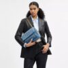 Elodie-crossbody-veske i regenerativ bomull med vattering
