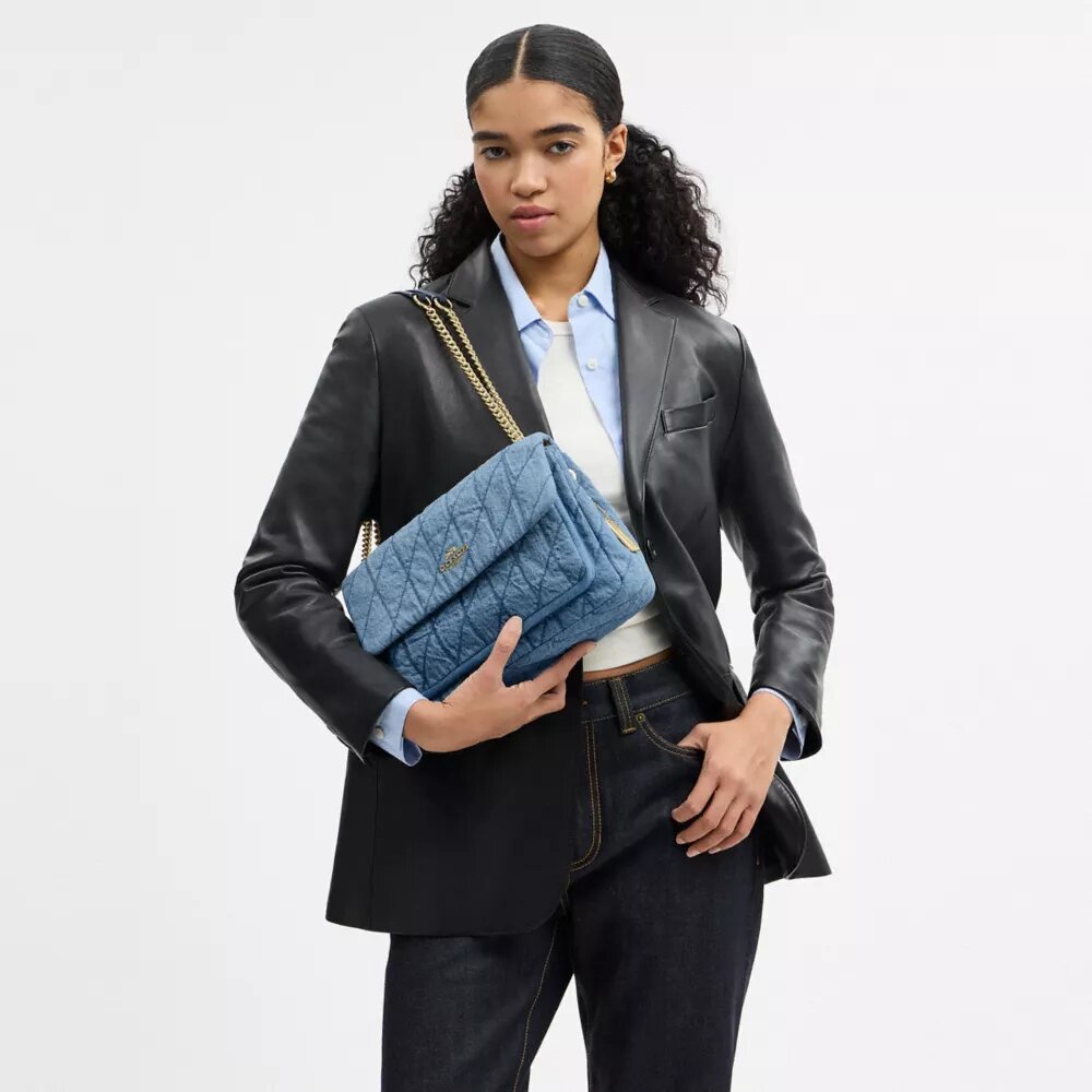 Elodie-crossbody-veske i regenerativ bomull med vattering