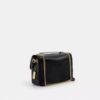 Elodie-crossbody-veske i Signature Canvas