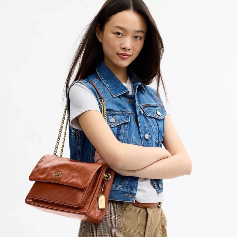 Elodie-crossbody-veske med vattering