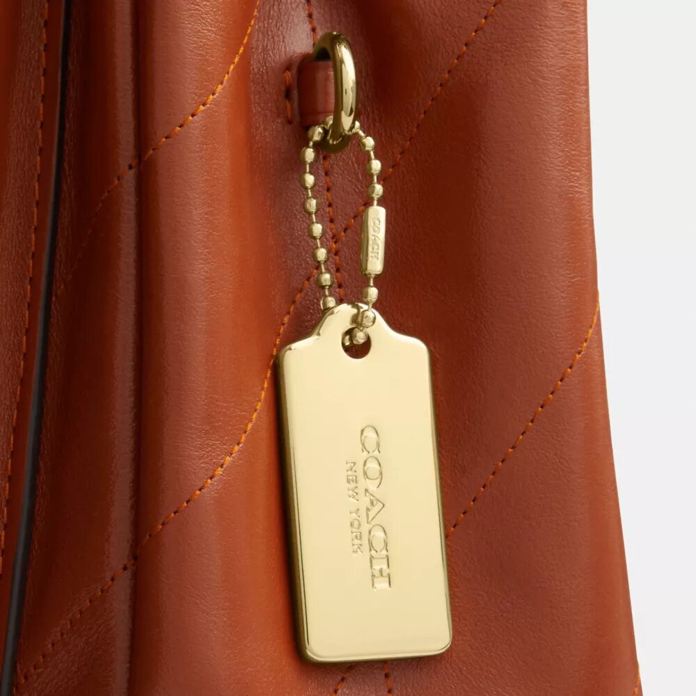 Elodie-crossbody-veske med vattering