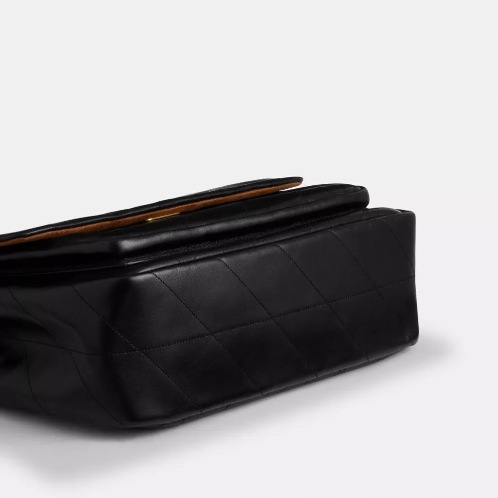 Elodie-crossbody-veske med vattering