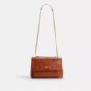 Elodie-crossbody-veske med vattering
