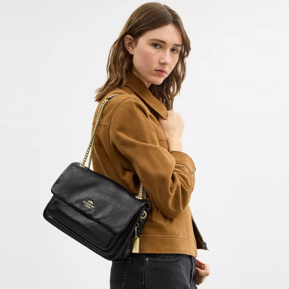 Elodie-crossbody-veske med vattering
