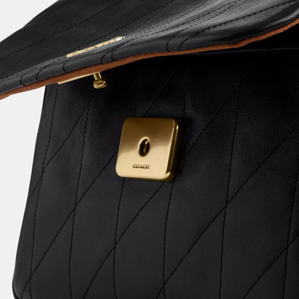 Elodie-crossbody-veske med vattering