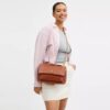 Elodie-crossbody-veske med vattering