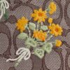Faye Miniveske i signaturjacquard med blomsterbroderi