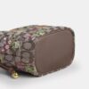 Faye Miniveske i signaturjacquard med blomsterbroderi