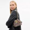 Faye Miniveske i signaturjacquard med blomsterbroderi