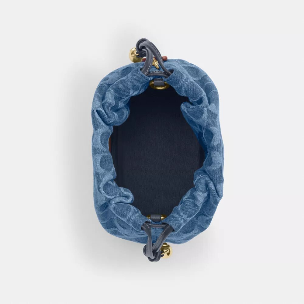 Faye Miniveske med snøring i signaturdenim