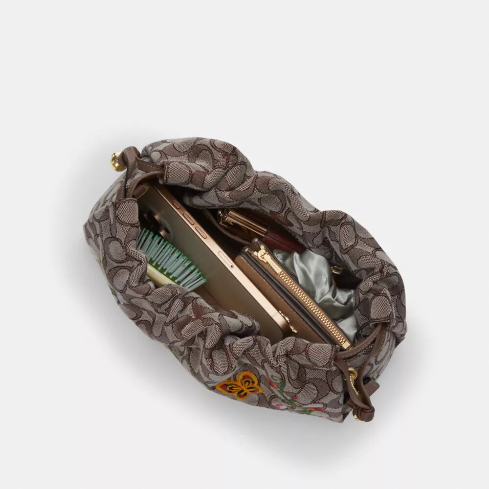 Faye-skulderveske i signatur-jacquard med blomsterbroderi