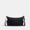 Finn-crossbody-veske med lommer