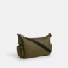 Finn-crossbody-veske med lommer