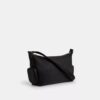Finn-crossbody-veske med lommer