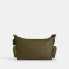 Finn-crossbody-veske med lommer