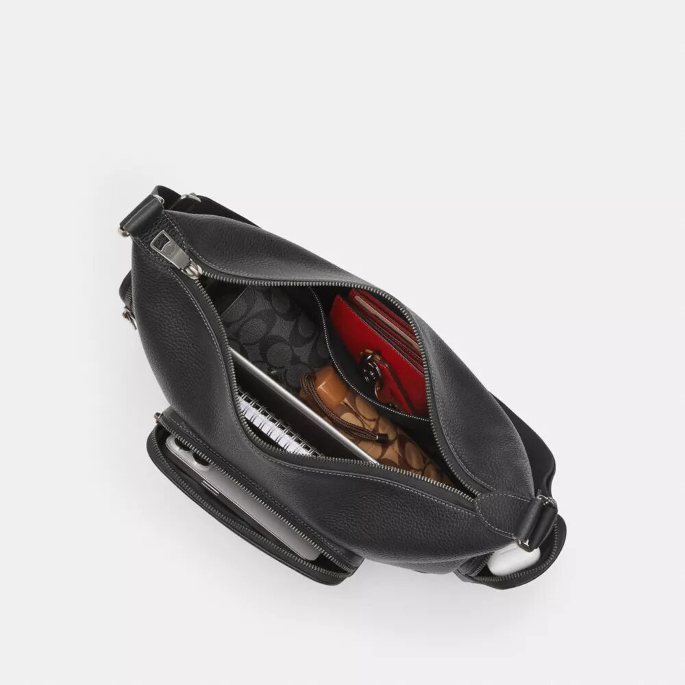 Finn-crossbody-veske med lommer