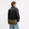 Finn-crossbody-veske med lommer
