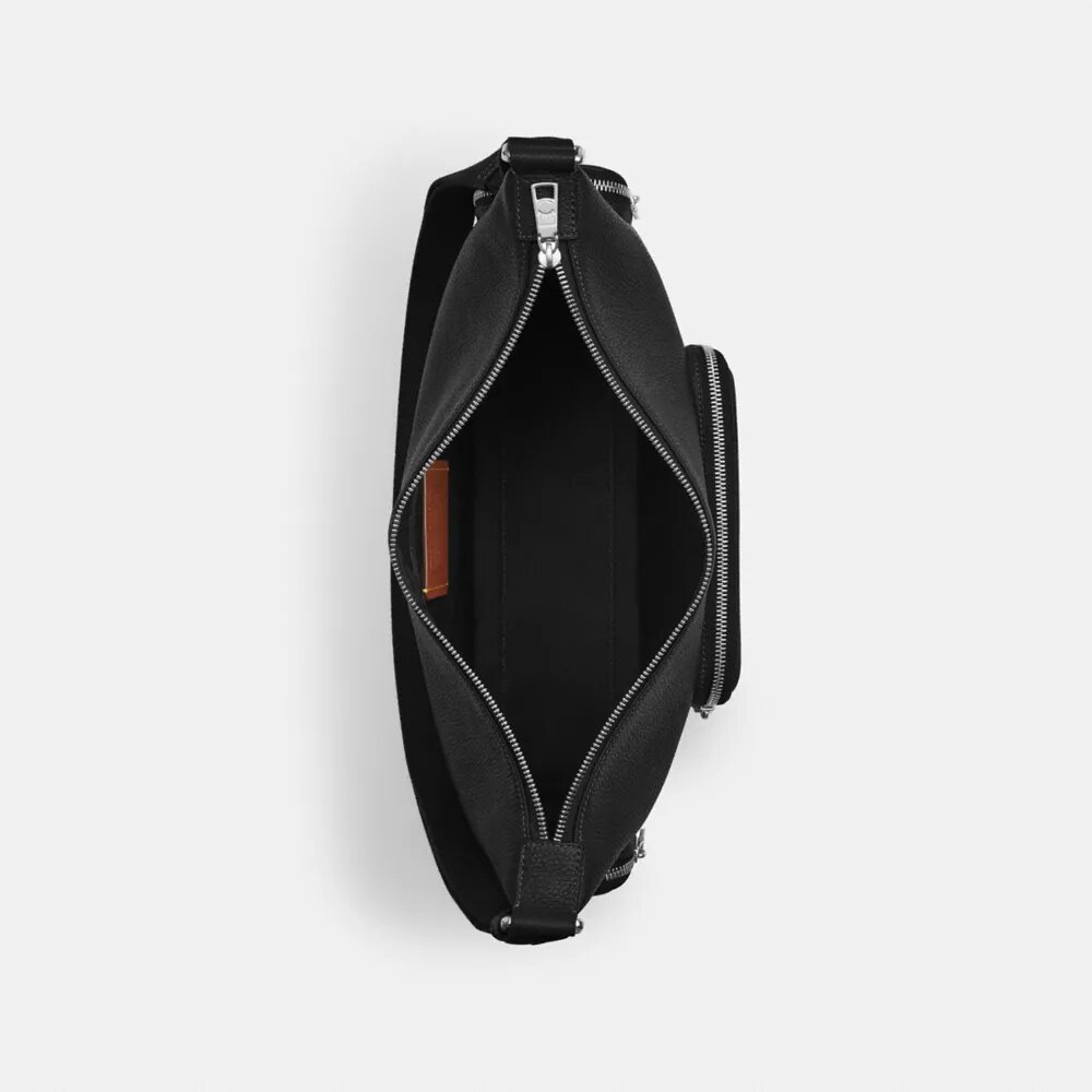 Finn-crossbody-veske med lommer