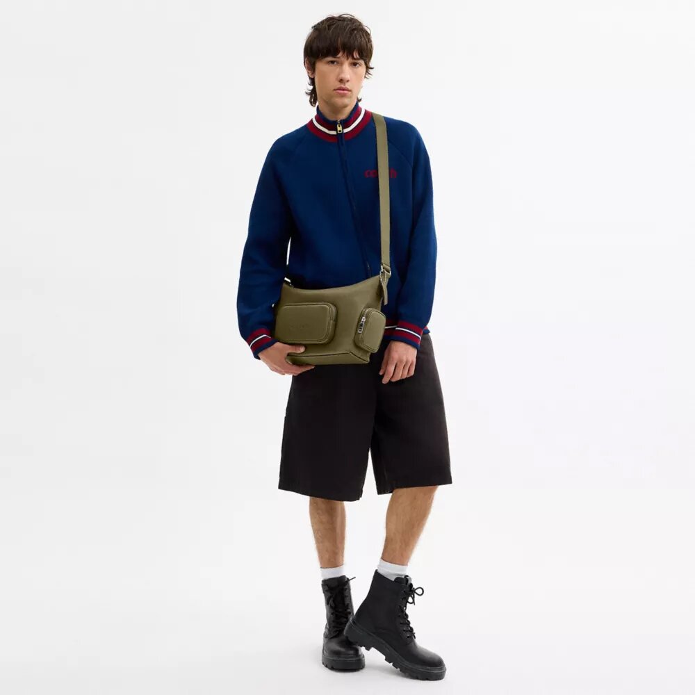 Finn-crossbody-veske med lommer