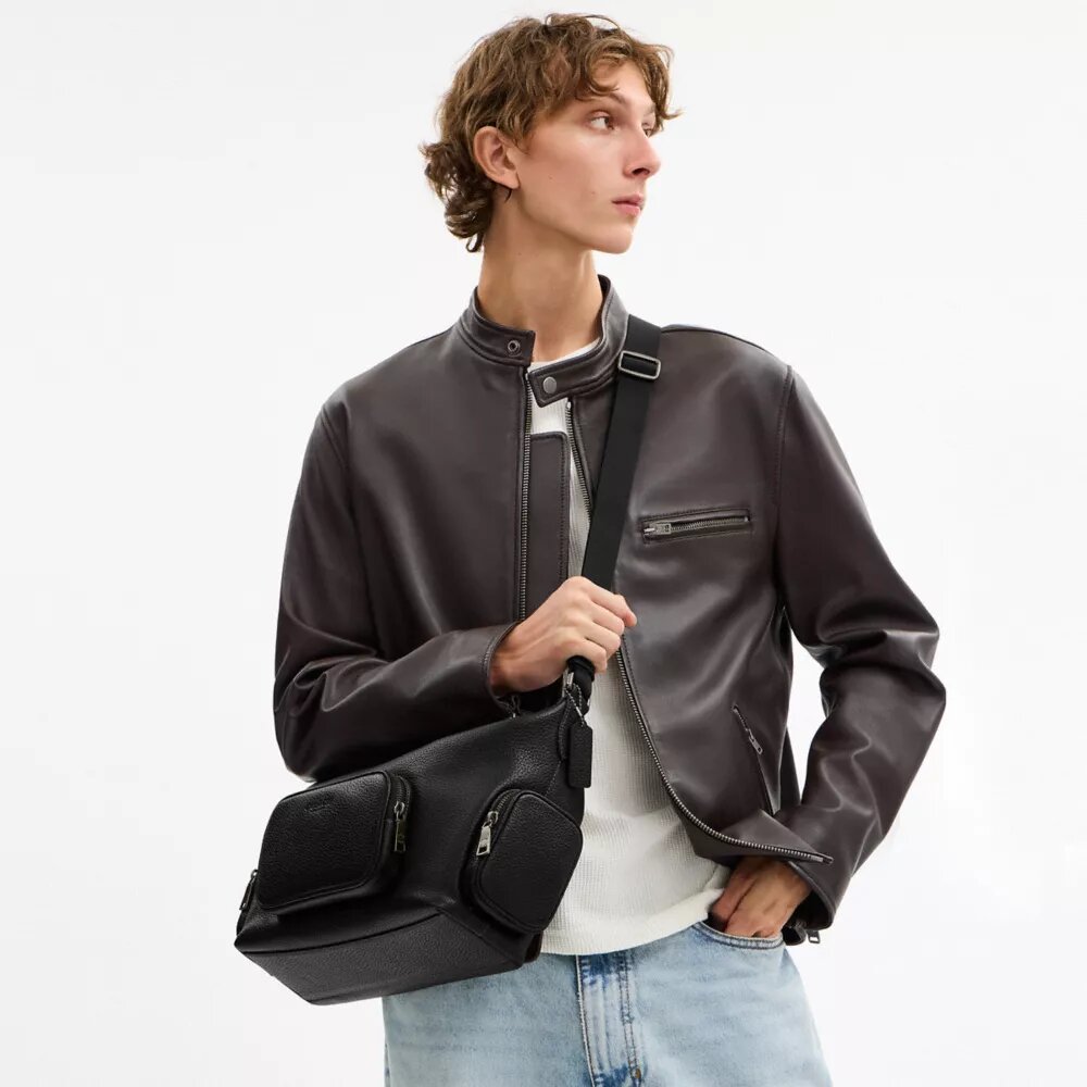 Finn-crossbody-veske med lommer