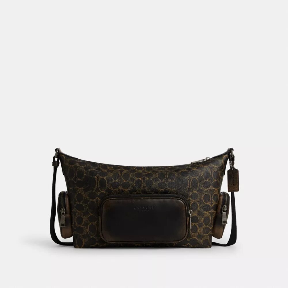 Finn-crossbody-veske med lommer i «Loved Signature Canvas»-kanvas