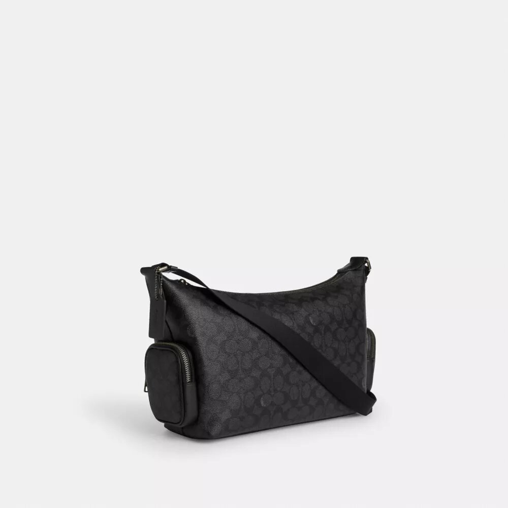 Finn-crossbody-veske med lommer i Signature Canvas