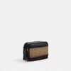 Graham-crossbody-veske i Signature Canvas