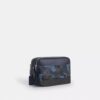 Graham-crossbody-veske med kryssrem i karakteristisk kamuflasjeprint